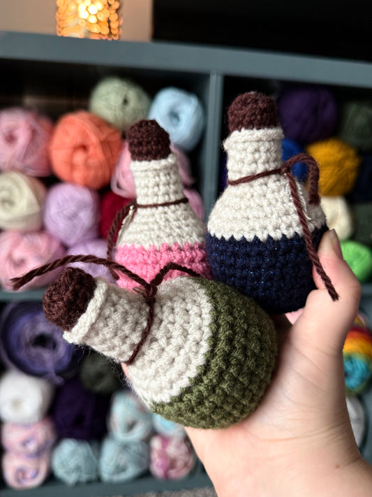 Tiny crochet potion bottles